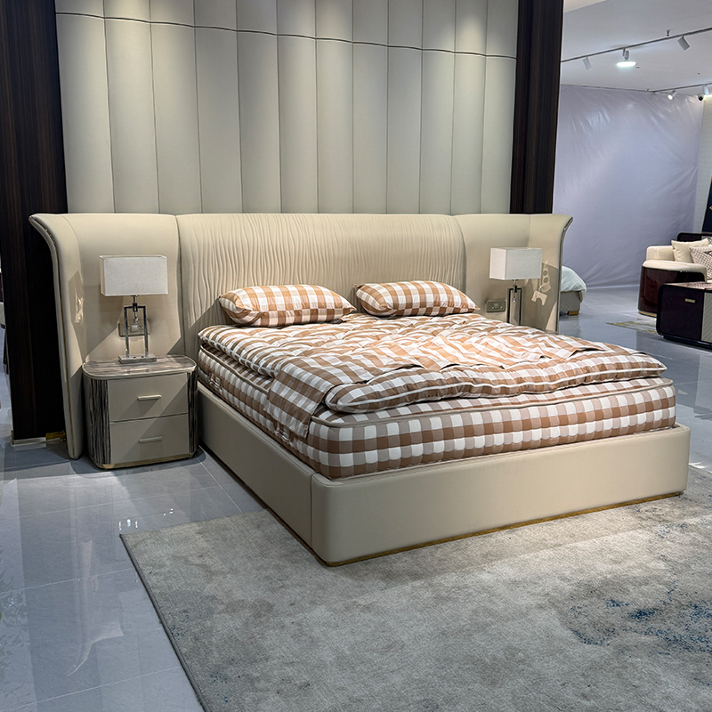 Ivory Extended Wing Headboard Bed in a furnished interior