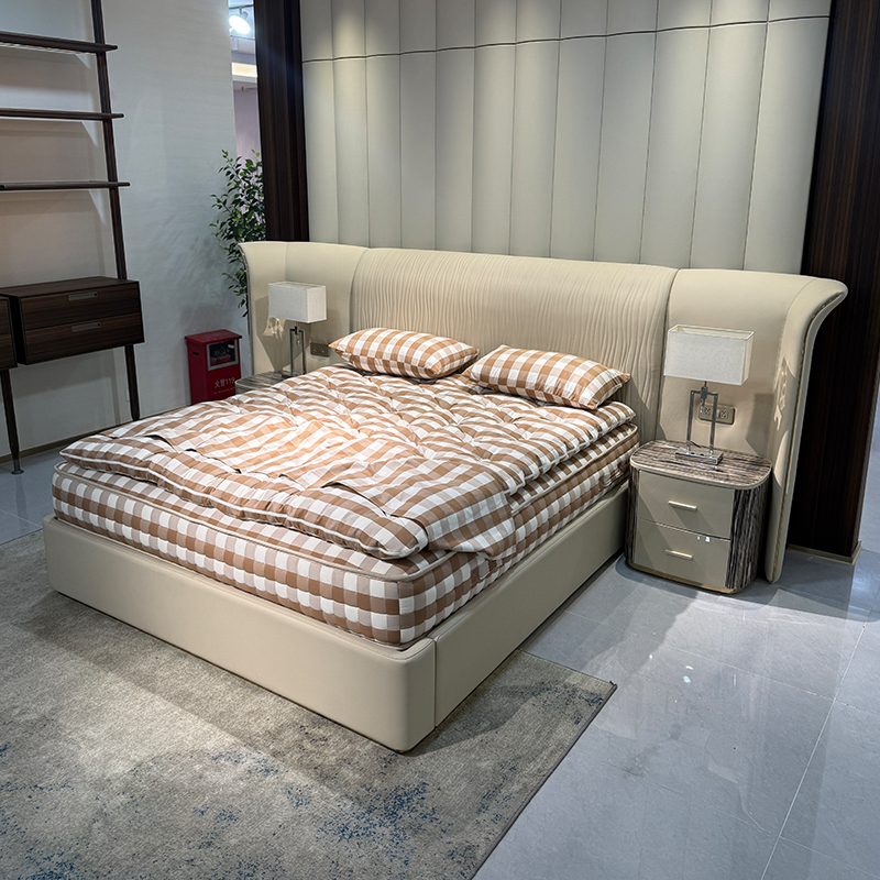 Ivory Extended Wing Headboard Bed in a furnished interior