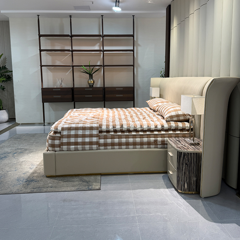 Ivory Extended Wing Headboard Bed in a furnished interior