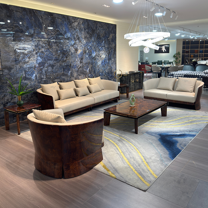 Ivory Curved Shell Sofa Collection in a furnished interior