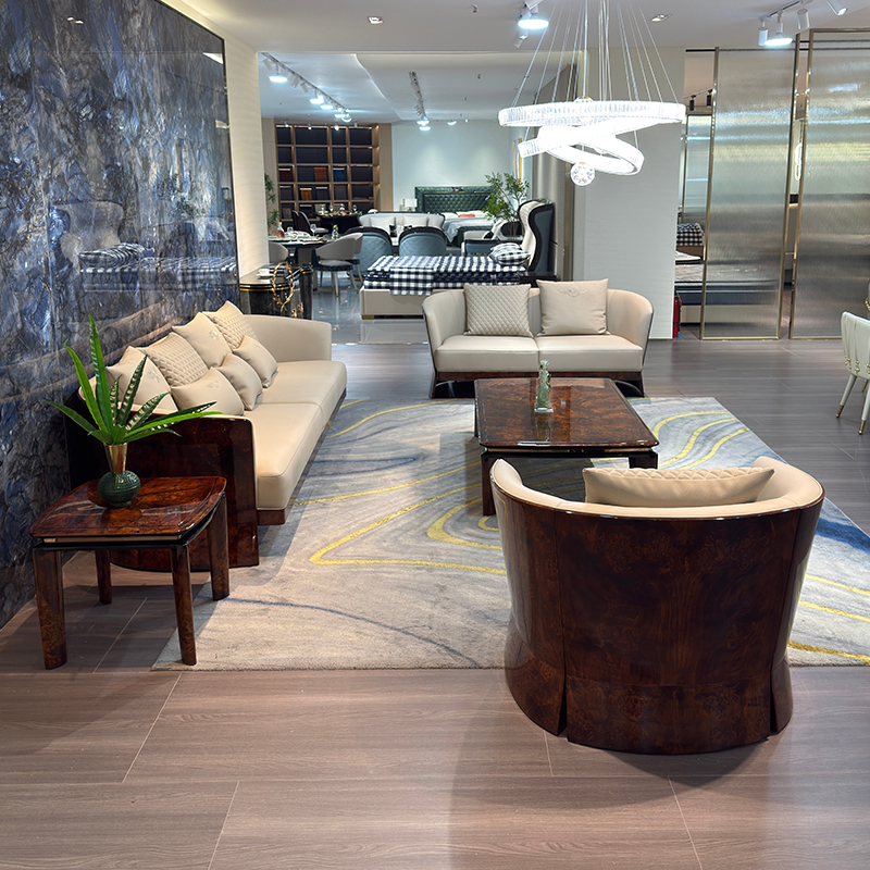 Ivory Curved Shell Sofa Collection in a furnished interior