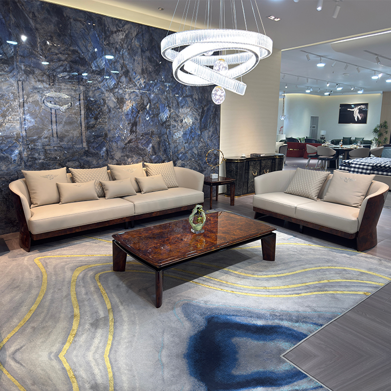 Ivory Curved Shell Sofa Collection in a furnished interior