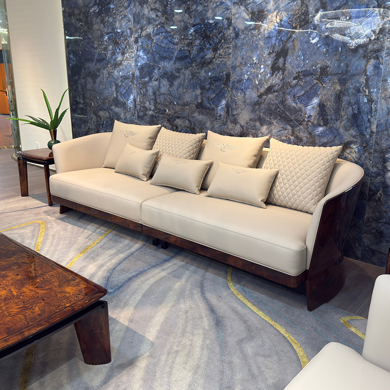 Ivory Curved Shell Sofa Collection in a furnished interior