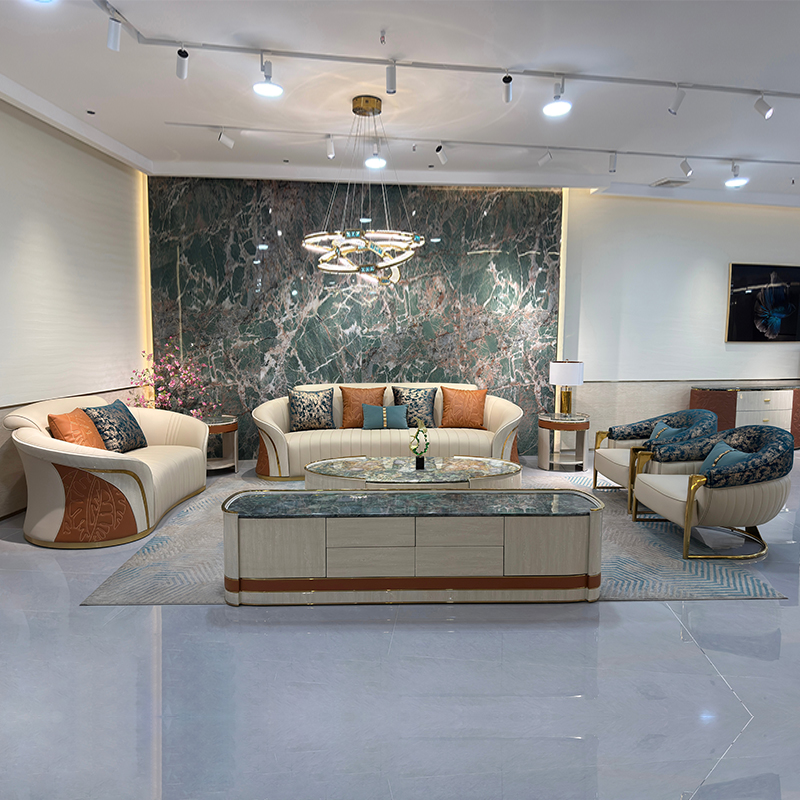 Ivory Sculpted Curve Sofa Collection in a furnished interior