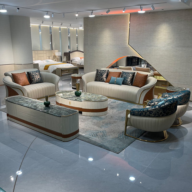 Ivory Sculpted Curve Sofa Collection in a furnished interior