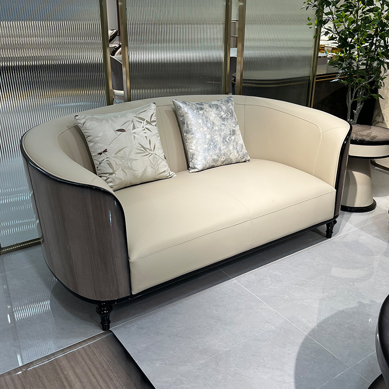 Ivory Rounded Panel Sofa Collection in a furnished interior